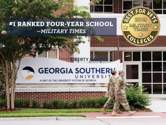 Soldiers walking in front of Georgia Southern University's Sign.